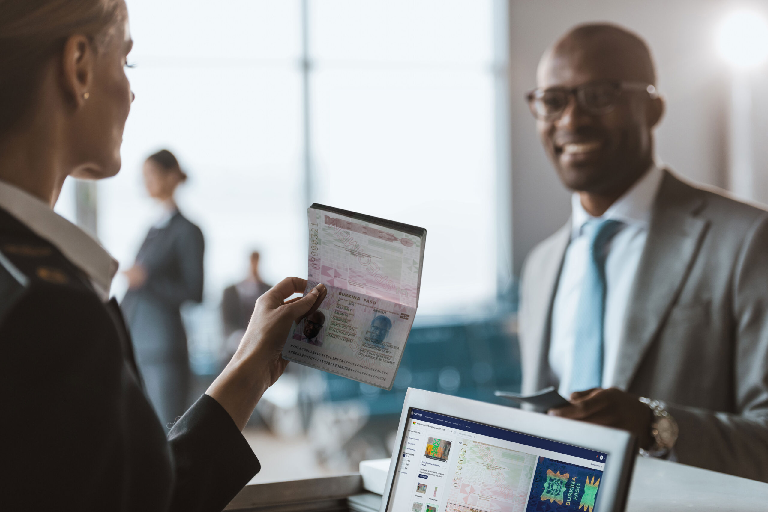 Woman checking passport with DocumentChecker.